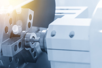 The inside grinding machine .The tool for grinding the sample part on the CNC lathe machine .Hi precision manufacturing concept.