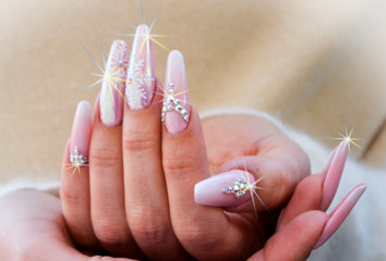 nails with pink Christmas decorations