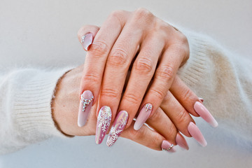 nails with pink Christmas decorations