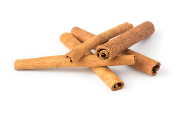 cinnamon sticks on white background