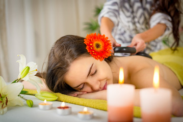 Obraz na płótnie Canvas Spa hot stone massage