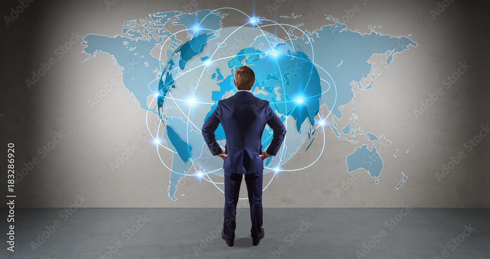 Poster businessman using digital planet earth interface on a wall 3d rendering