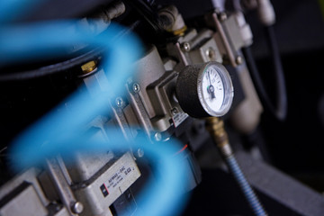Fototapeta na wymiar detail of manometer on cnc industrial machine