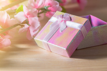 Gift box wrapped Christmas and Newyear presents with bows and ribbons, Christmas frame boxing day background and banner.
