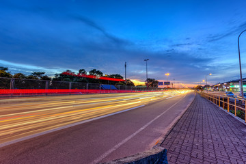 1 Dec 2017 Taman Perlin, Johor Bahru, Malaysia :Light trails at blue hour on road of traffic lights with long exposure photography
