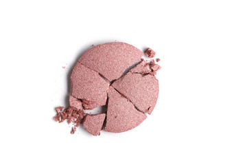 Round pink crashed eyeshadow product isolated on white background