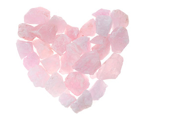 Pink quartz. Heart of rose  quartz crystal  isolated on white background