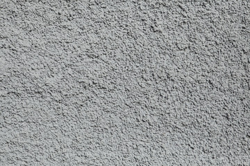 Grey painted stucco wall. Background texture