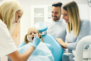 Family in dental office