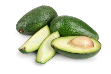 whole and half avocado isolated on white background close-up. Top view