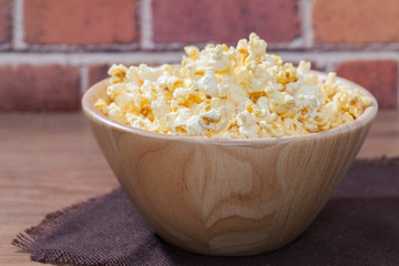 popcorn in wooden bowl