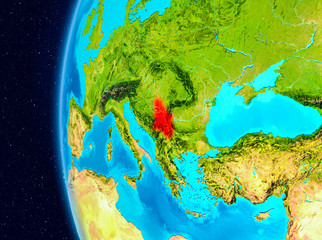 Space view of Serbia in red