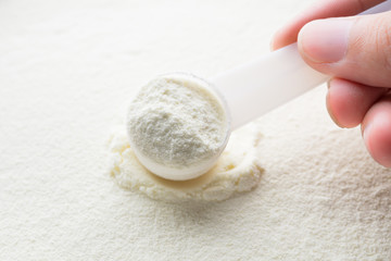 Powdered milk with spoon for baby