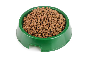 dry cat food in bowl isolated on white background