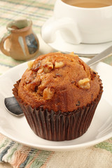 Muffin on dish on the table 