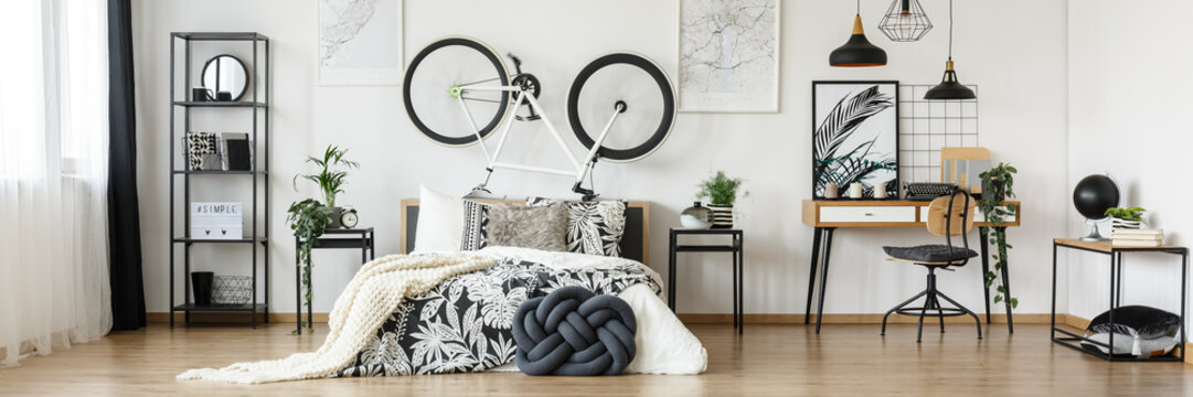 Open space bedroom with bicycle