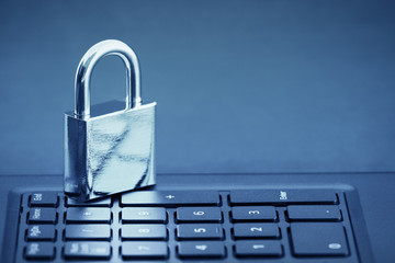 Computer security concept. Padlock on computer keyboard 