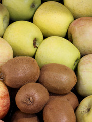 background of fruits like apples and kiwi