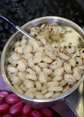 cooked onions and put in olive oil for sale in the outdoor marke
