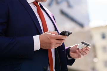 Payment for the goods by credit card with the phone.