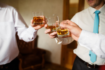 Men drinking cognac.