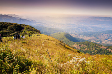 Group of peoples walking route on top the mountain view point in Kew Mae Pan The Doi Inthanon National Park in Chiang Mai, Thailand.  