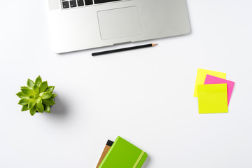 Modern laptop and business accessories on white background