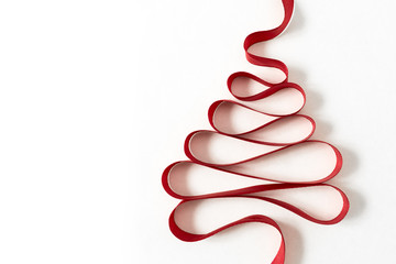 Bright red ribbon christmas tree horizontal greeting card isolated on white.