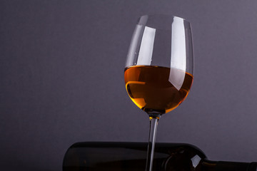 White wine glass and bottle