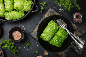 savoy cabbage rolls stufed with meat and vegetables - obrazy, fototapety, plakaty
