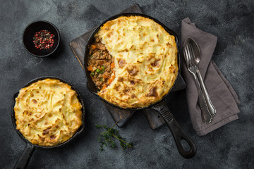 shepherd's pie. Minced meat, mashed potatoes and vegetables casserole in cast iron pan
