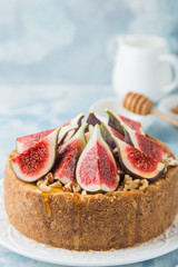 delicious cheesecake  served with fresh figs, nuts and honey