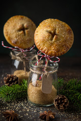 delicious apple pie pops, dark background,