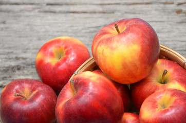 Fototapeta na wymiar red apple on the wood floor