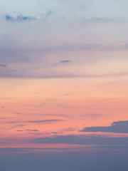 A charming of beautiful sky background. The twilight moment of sky after sunset is so fantastic, its color is in the gradient shade of purple and pink. Such a nice moment to catch