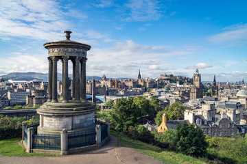 Fototapeta na wymiar Dugald Stewart monument on Calton Hill with a view on Edinburgh