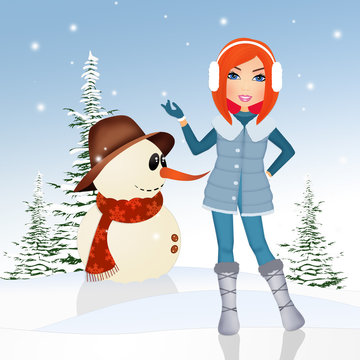 girl making snowman