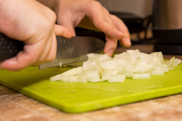 Cutting onion close up
