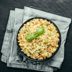 cauliflower rice with vegetables. copy space