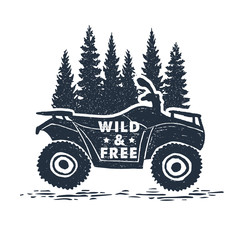 Hand drawn inspirational label with pine trees and quad bike textured vector illustrations and "Wild and free" lettering. © SlothAstronaut