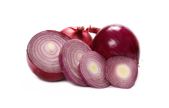 Red onion bulbs and slices isolated on white background