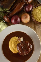 Pork leg with creamy polenta