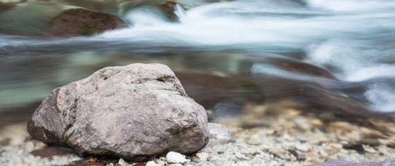 Autumn. Warm and cold colors in the torrent gorge