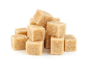 Brown cane sugar cubes isolated