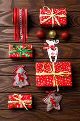 Fototapeta na wymiar Christmas background with colorful decorations on an old wooden table