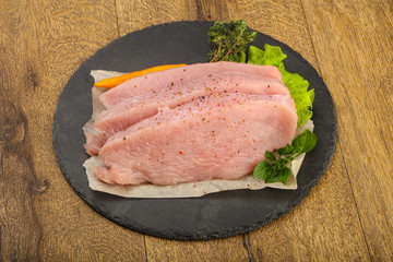 Raw turkey steak