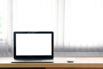 laptop Computer for business ,background blur of curtain window.copy space.