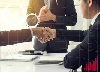 Business people shaking hand to cooperate and deal in business successful.