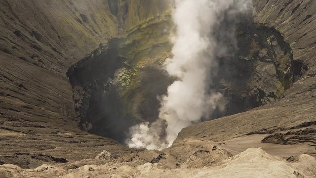 Mountain Bromo active volcano crater in East Jawa, Indonesia. Volcano crater Mount Gunung Bromo is an active volcano,Tengger Semeru National Park. 4K video.
