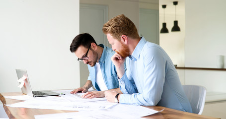 Fototapeta premium Group of architects working on project